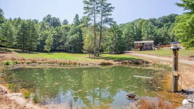 Photo of 22.42 Acres with Shell Home and Outbuildings in Murphy, North Carolina