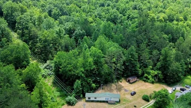 Photo of $89,900 – 2-Bedroom Mobile Home with Trails on 37.98 Acres in Manchester, KY