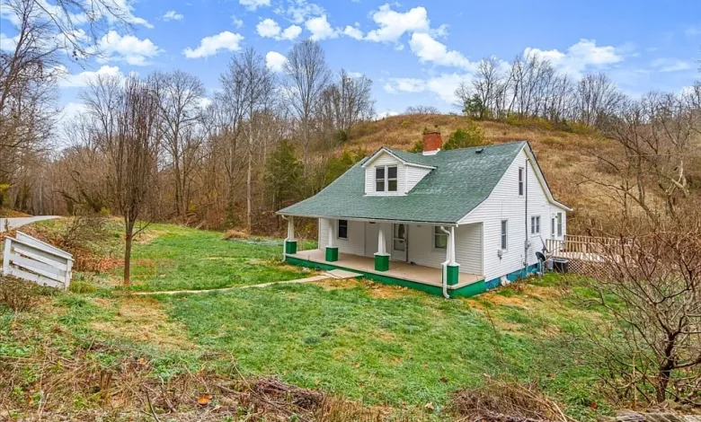Stunning 51+ Acre Farm with Updated Home, Barn, Ponds, Creek, and Endless Potential