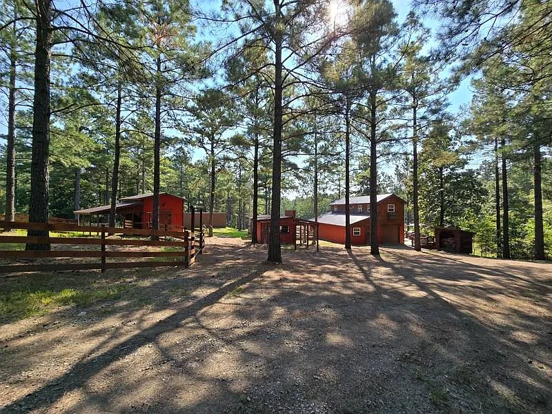 Secluded Homestead with Pond on 8.02 Acres. $259,000