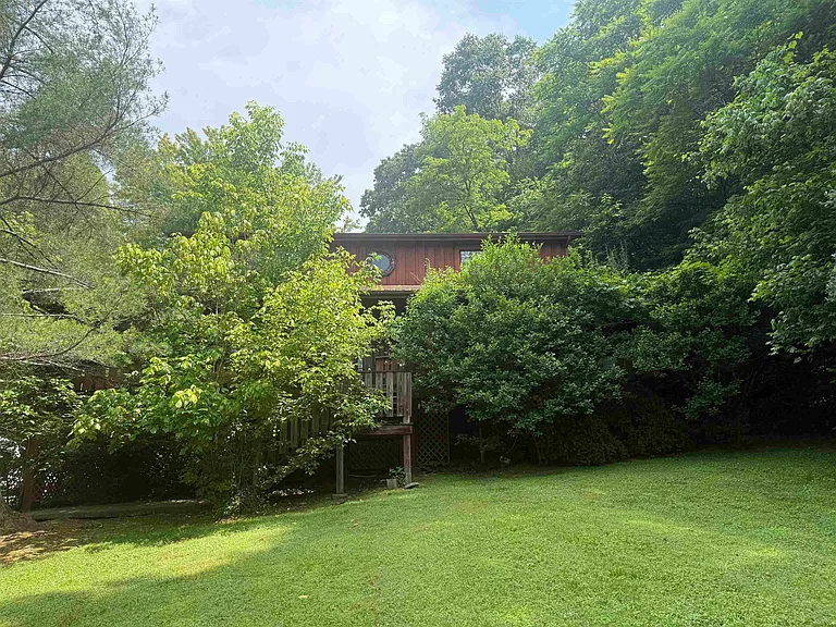 Spacious Rural Home with Endless Potential and Private Acres in Fort Gay