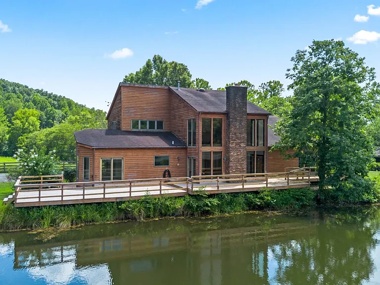 Private Country Home with Scenic Land and Peaceful Lake Setting