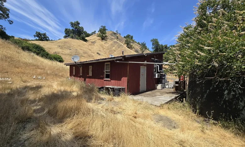 Dual-Cabin Sanctuary on 40 Acres with Ponds, Meadows, and Valley Views