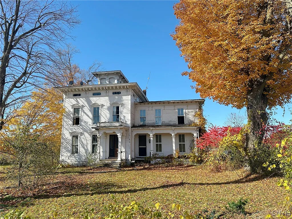 Look at those archways! Massive C. 1840 Colonial on nearly 3 acres in New York. $60,000.