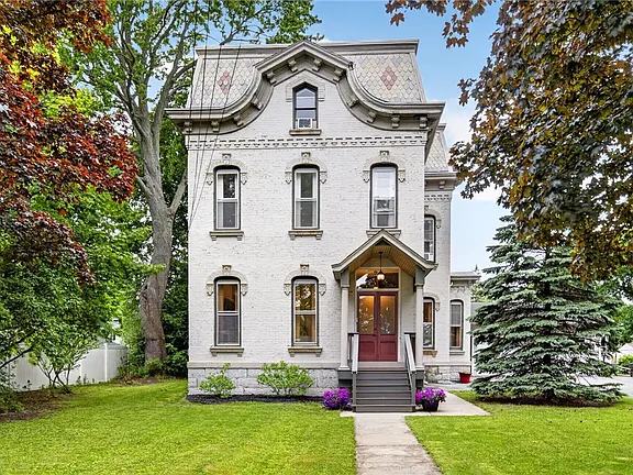 This $399,000 Second Empire Victorian in Auburn, New York Has 6 Bedrooms, 4 Fireplaces, and a Curved Grand Staircase