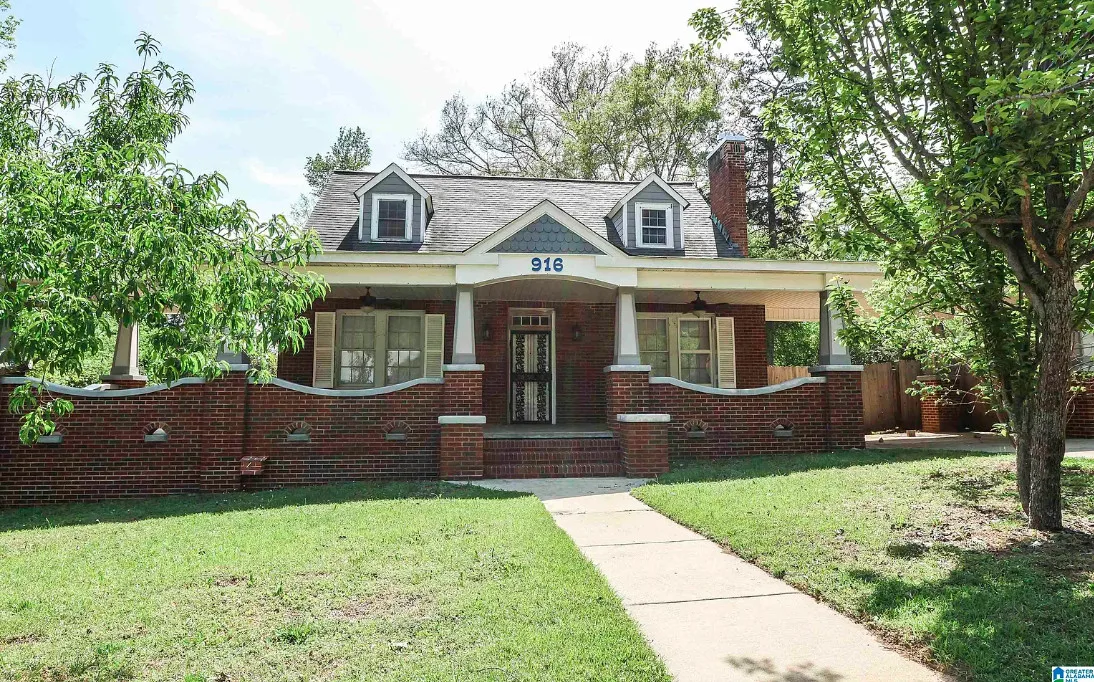 A 1930 Brick Home in Anniston, Alabama with Original Hardwoods, a Wood-Burning Fireplace, and a Huge Front Porch for $139,900