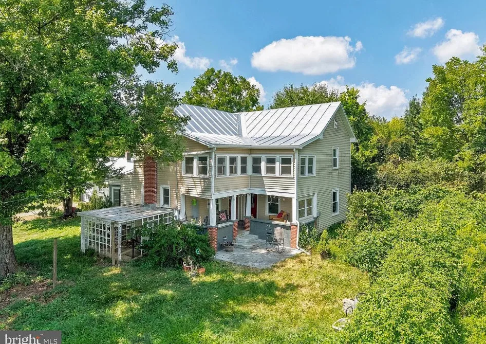 A 1900 Farmhouse on 6.9 Acres in Quicksburg, Virginia, With an Upstairs Sunroom, an Old Barn and Blue Ridge Views for $325,000